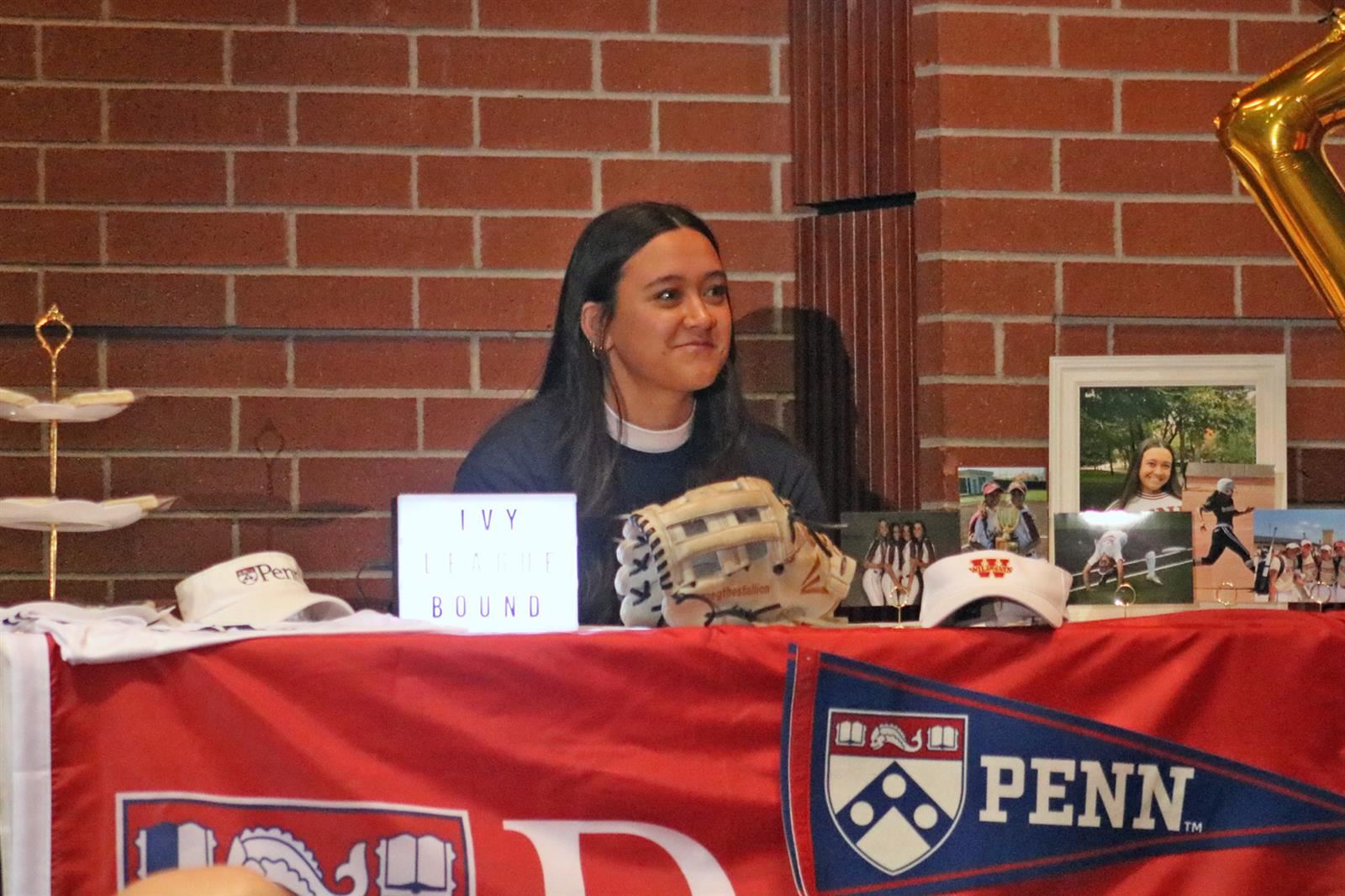 Cypress Woods High School senior Megan Huang signed a letter of intent to play softball at the University of Pennsylvania.